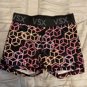 VSX athletic shorts orange and pink